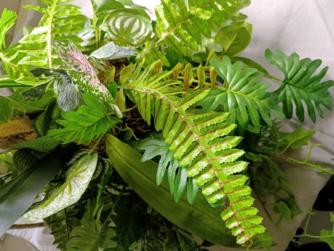 hanging kokedama botanical greenery arrangement with rope